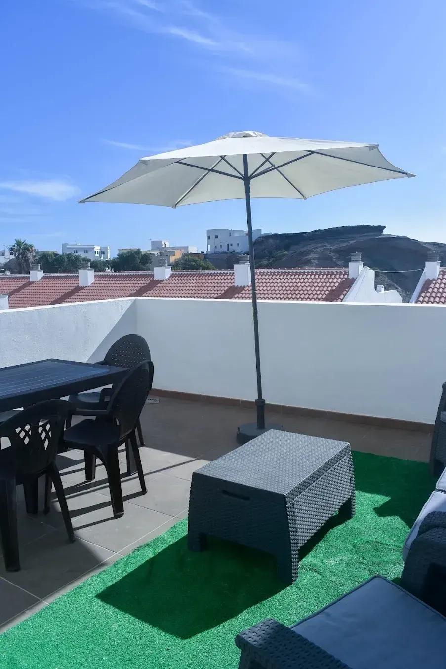 Terraza con parasol